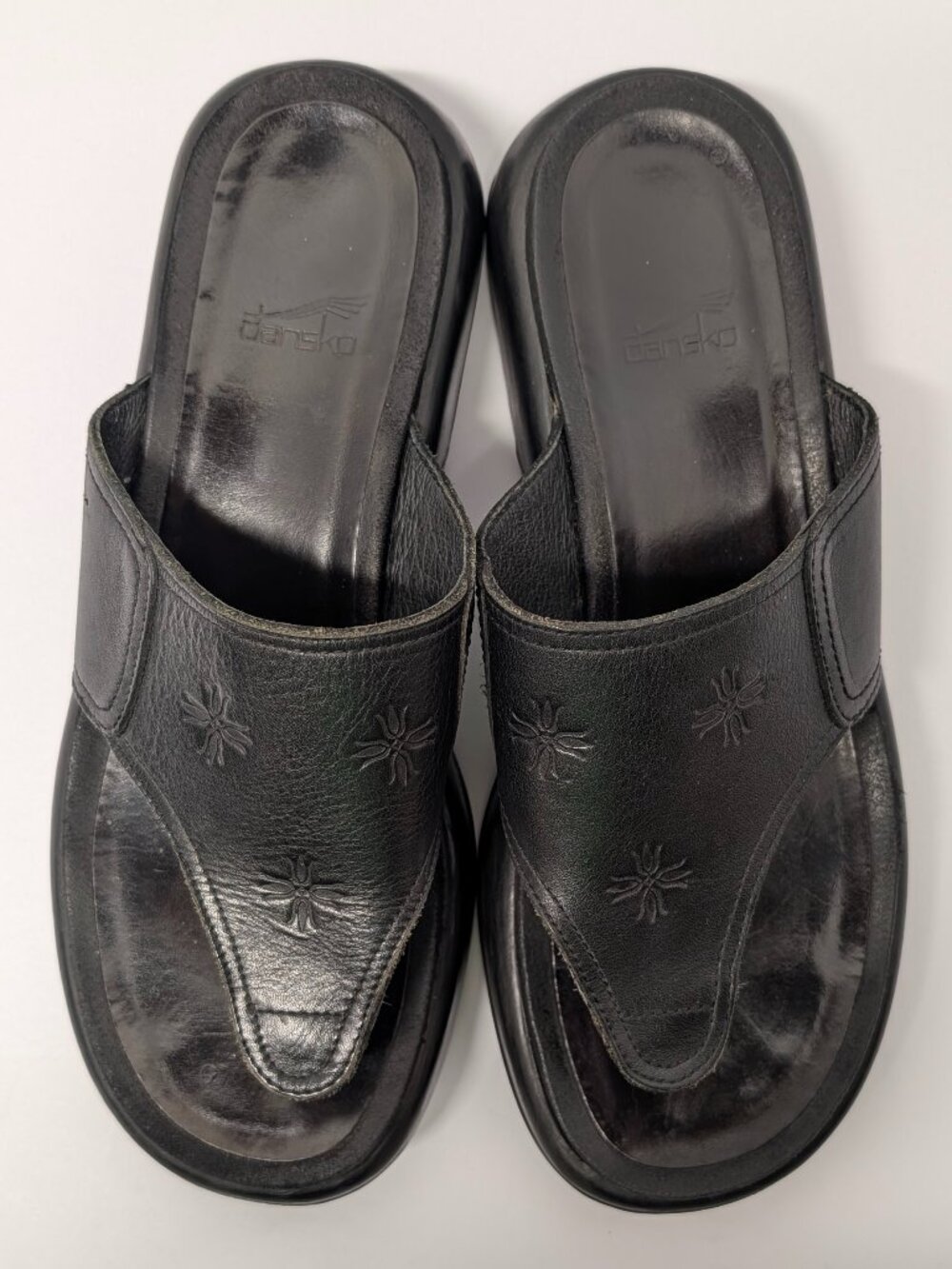 Dansko Floral Embossed Thong Sandals in Black Leather